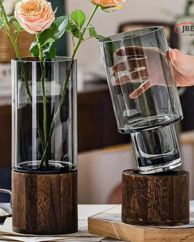 Glass flower vase with wooden base