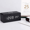 Wooden alarm clock with wireless charging pad