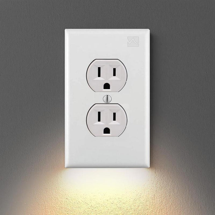 Outlet wall plate with LED night lights
