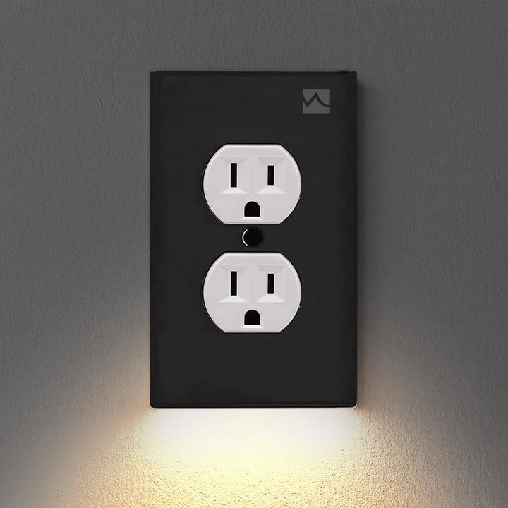 Outlet wall plate with LED night lights