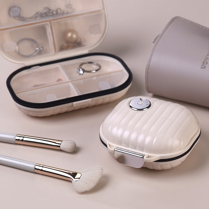 Portable daily pill box