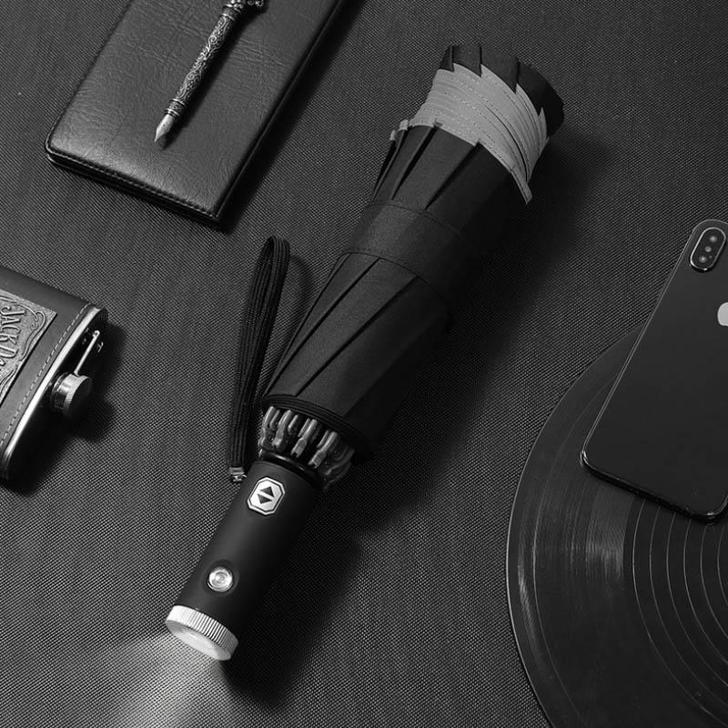 Automatic foldable umbrella with reflective edge