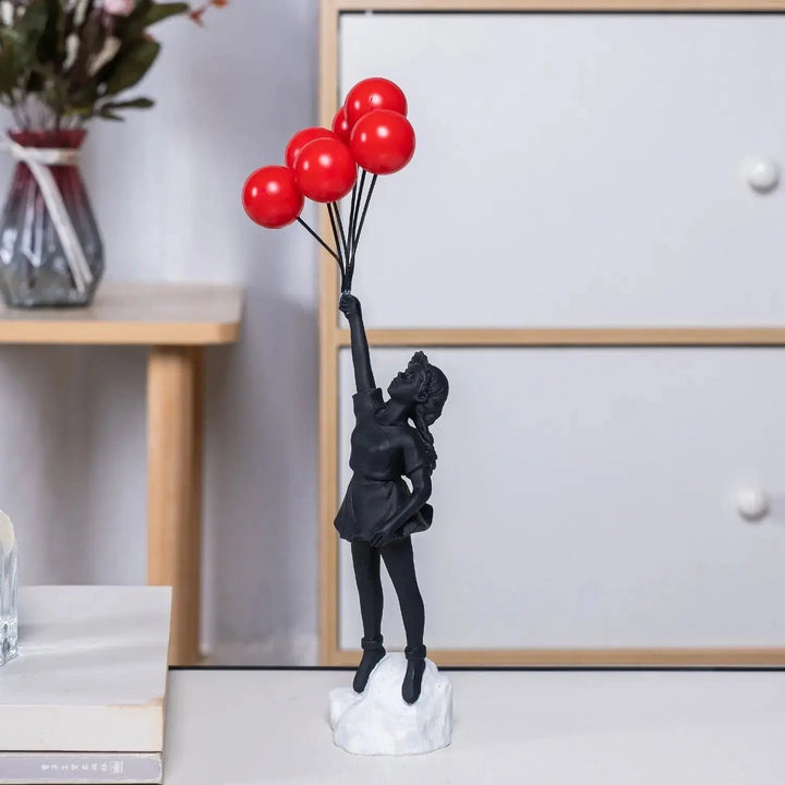 Banksy flying Balloon Girl Statue