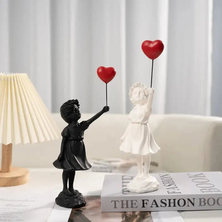 Banksy flying Balloon Girl Statue