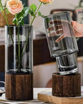 Glass flower vase with wooden base