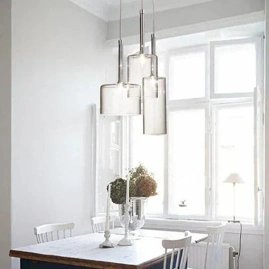 Pendant lamp for the dining table made of glass
