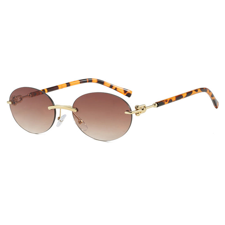 Women oval sunglasses with luxurious metal frame and mirrored lenses