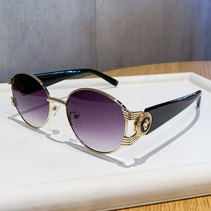Ladies elegant sunglasses with luxurious metal frame and mirrored lenses