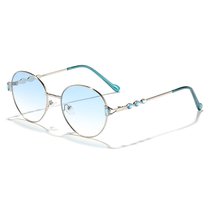 Women round sunglasses with elegant metal frame and mirrored lenses