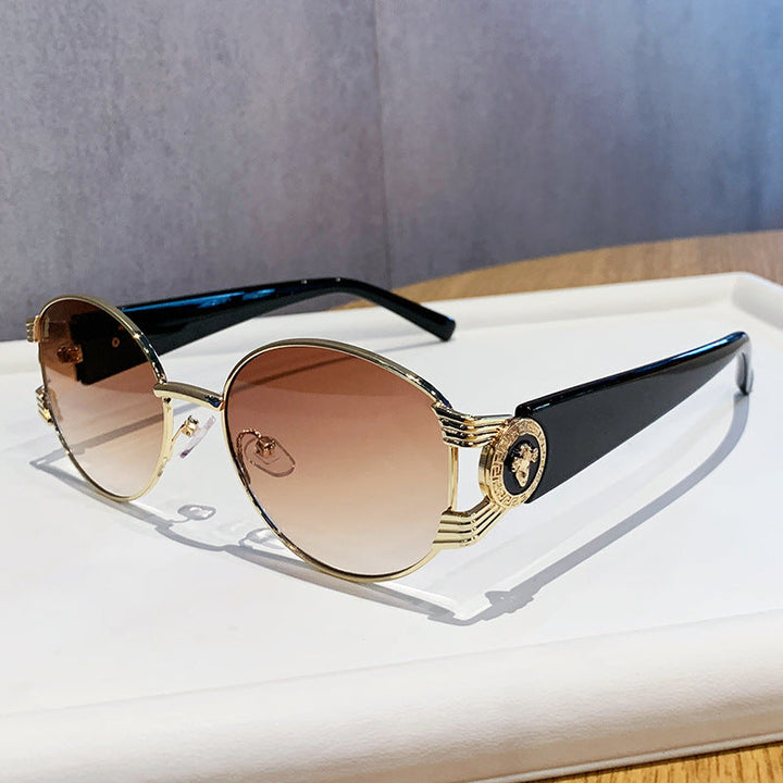 Ladies elegant sunglasses with luxurious metal frame and mirrored lenses