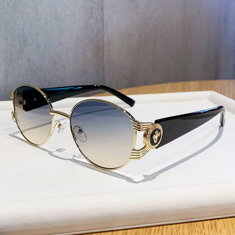 Ladies elegant sunglasses with luxurious metal frame and mirrored lenses