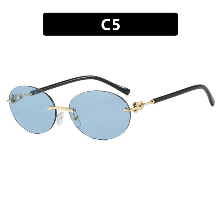 Women oval sunglasses with luxurious metal frame and mirrored lenses