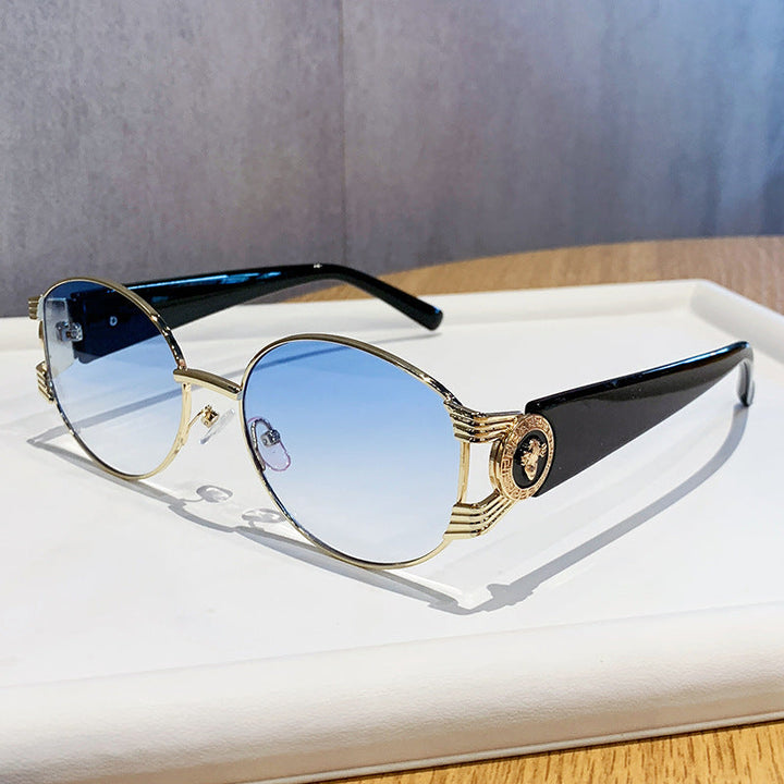 Ladies elegant sunglasses with luxurious metal frame and mirrored lenses