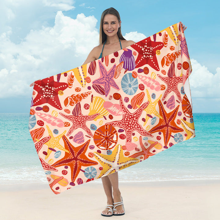 Beach towel with mirrored mandala design