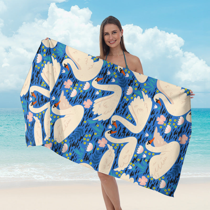 Beach towel with mirrored mandala design