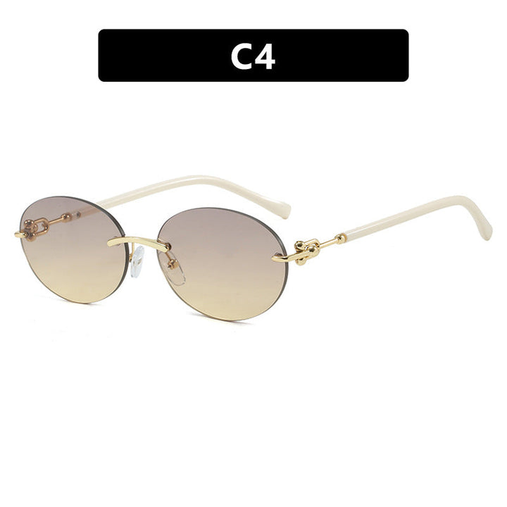Women oval sunglasses with luxurious metal frame and mirrored lenses