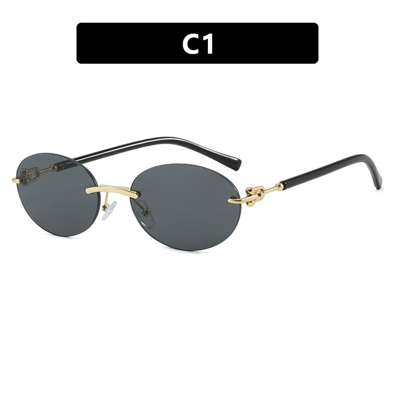 Women oval sunglasses with luxurious metal frame and mirrored lenses