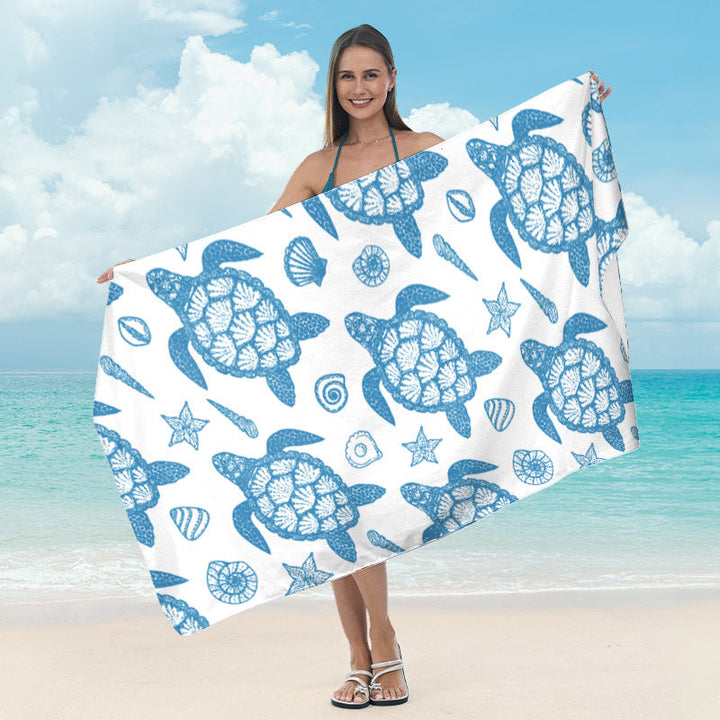 Beach towel with mirrored mandala design