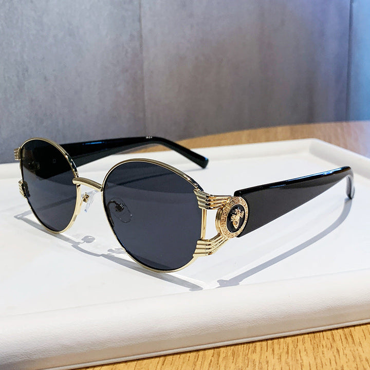 Ladies elegant sunglasses with luxurious metal frame and mirrored lenses