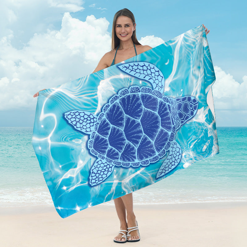 Beach towel with mirrored mandala design