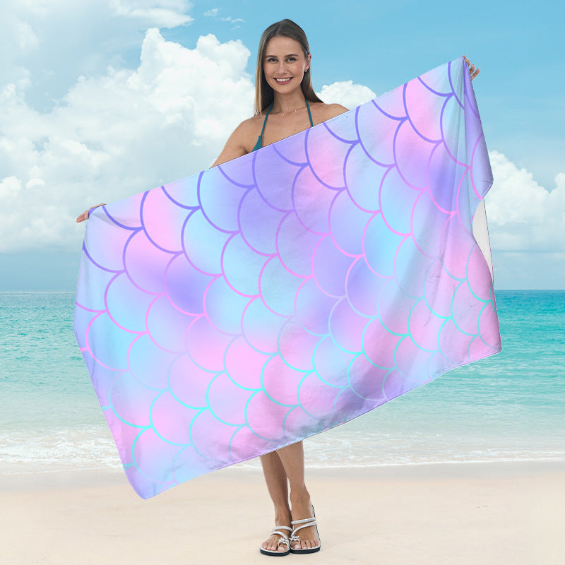 Beach towel with mirrored mandala design