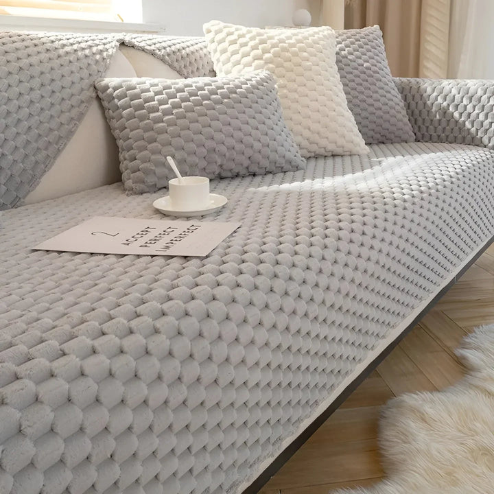 Luxurious velvet sofa cover with textured pattern