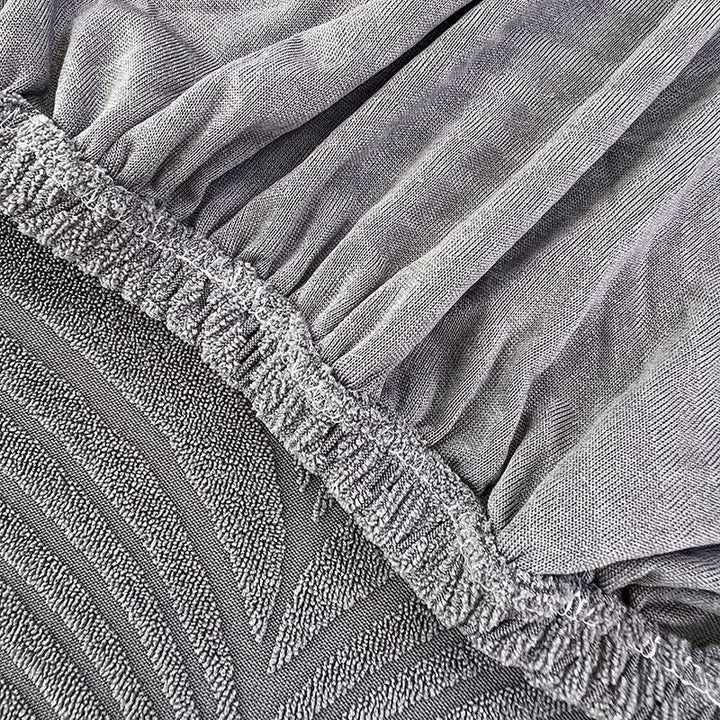 PlushSecure - Elegant Jacquard Sofa Cover for Non-Slip Comfort