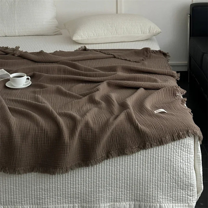 Solid colour cotton sofa blanket