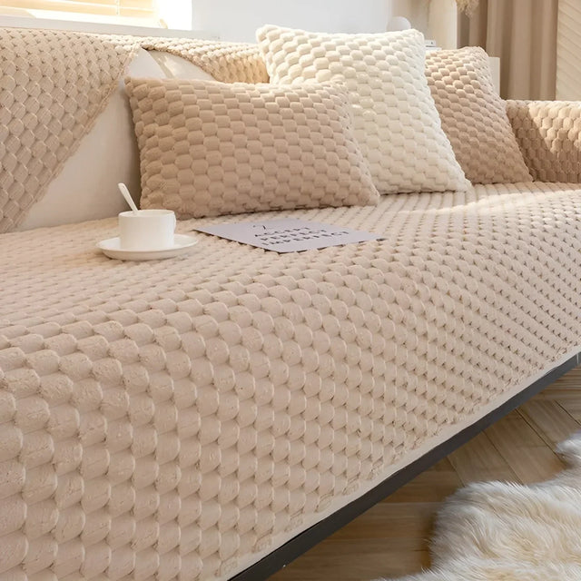 Luxurious velvet sofa cover with textured pattern