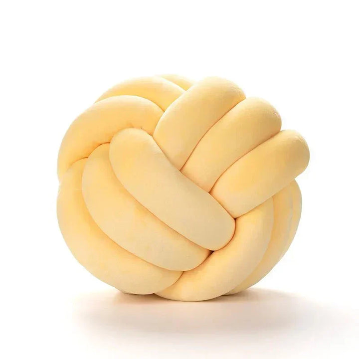 Decorative, soft cushion with knotted ball in suede look