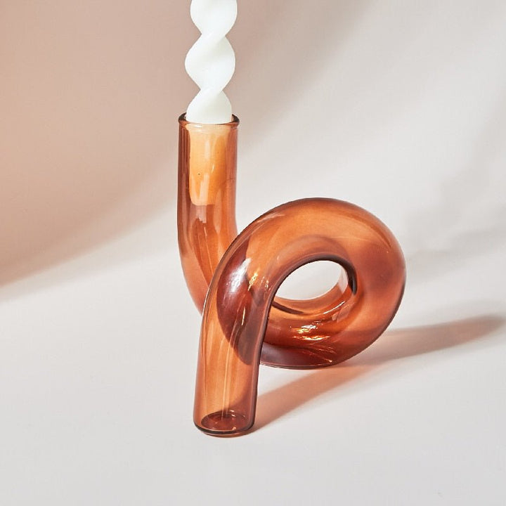 Candle holder made of glass vase