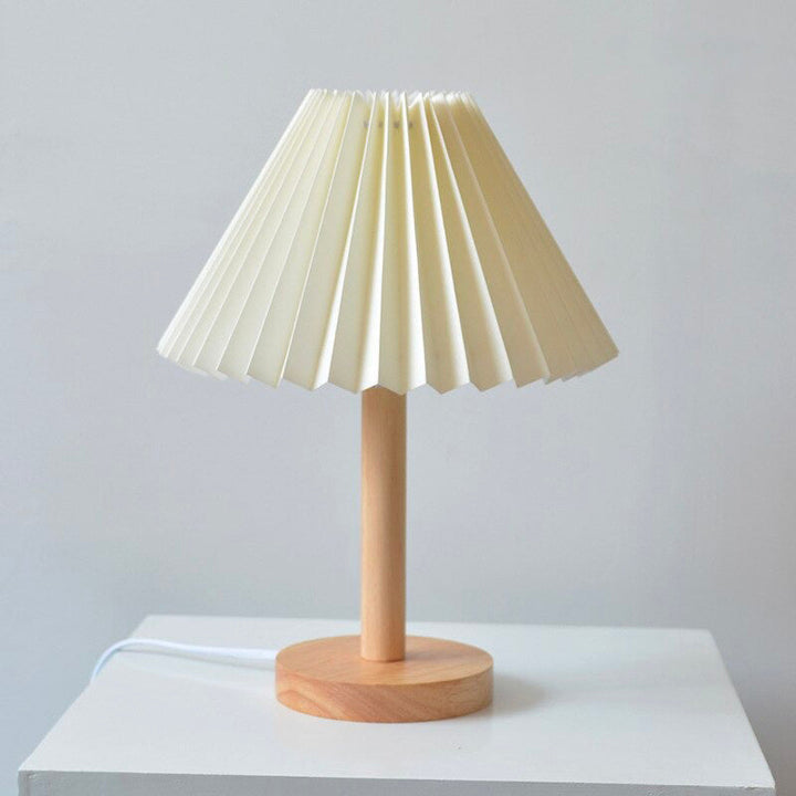 Wood bedside lamp with folded shade