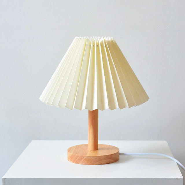 Wood bedside lamp with folded shade