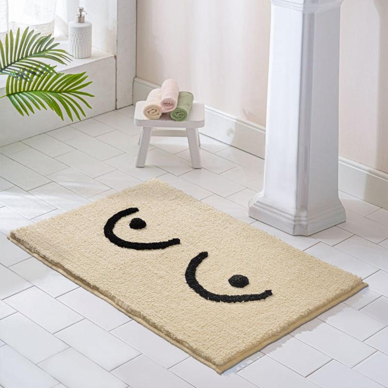 Bath mat with tits