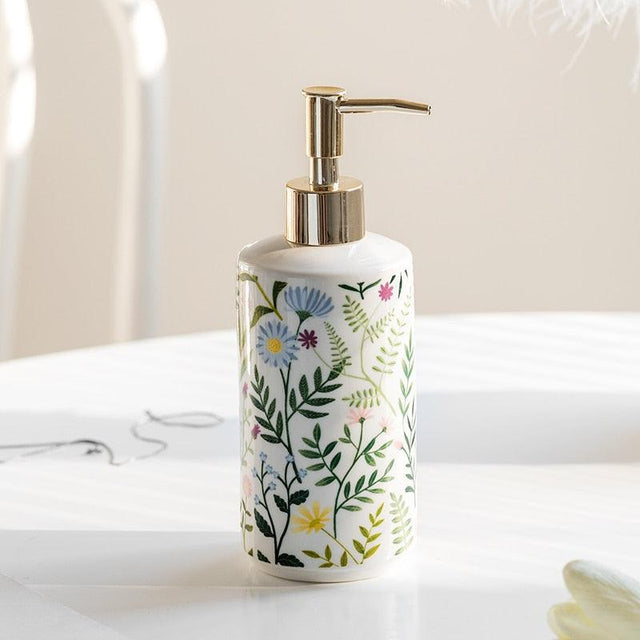 Soap dispenser made of ceramic with floral design