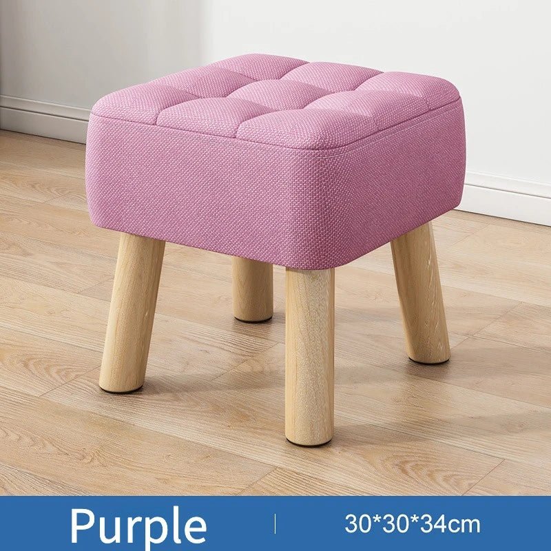Padded ottoman stool in retro style in pastel colours