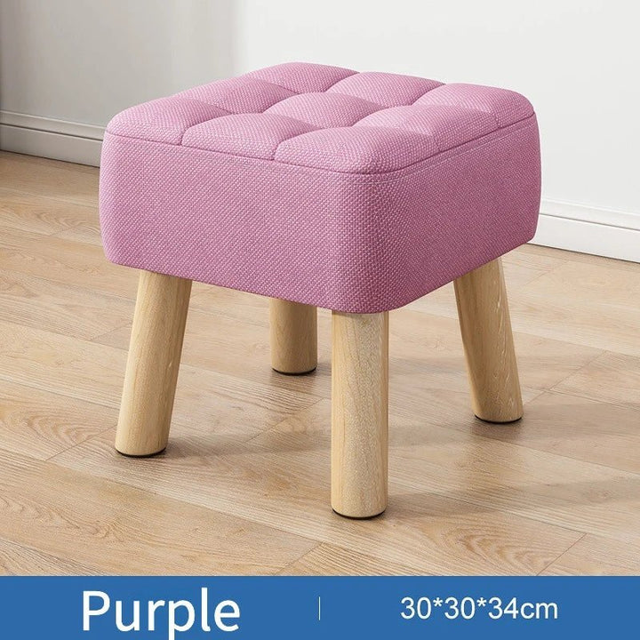 Padded ottoman stool in retro style in pastel colours