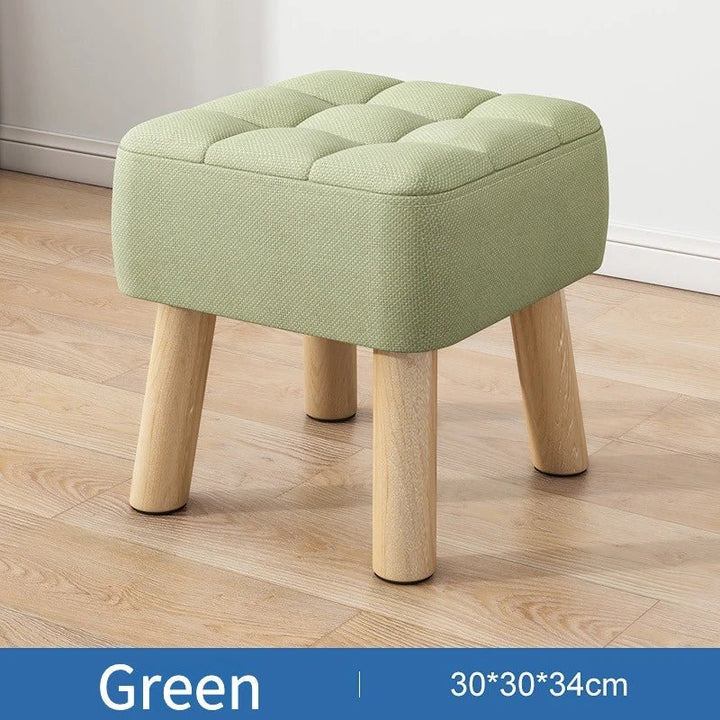 Padded ottoman stool in retro style in pastel colours