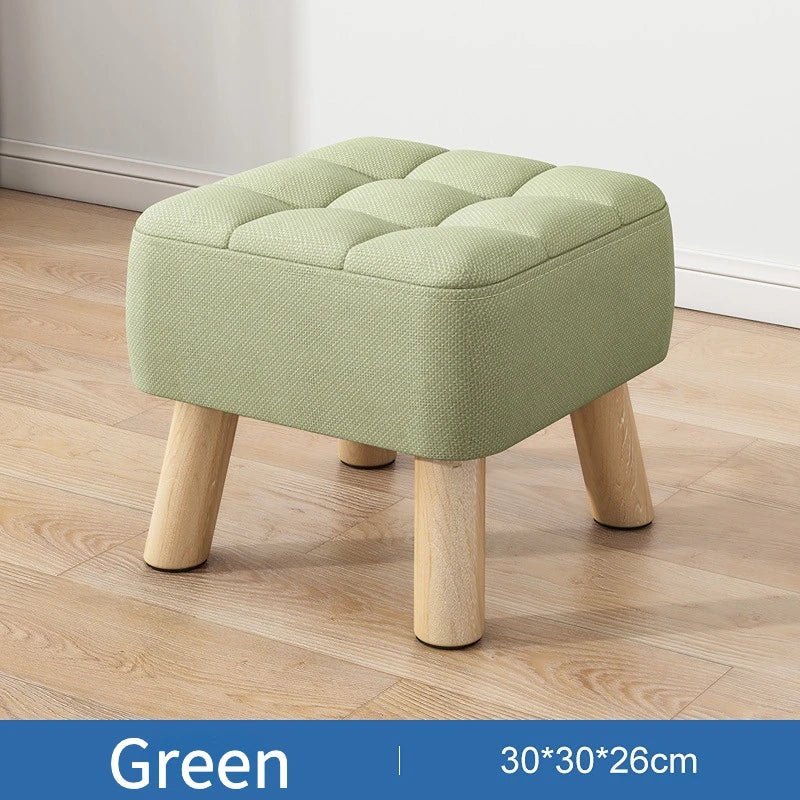Padded ottoman stool in retro style in pastel colours