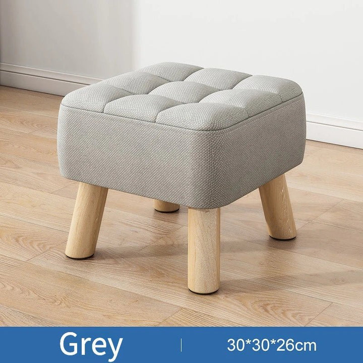 Padded ottoman stool in retro style in pastel colours