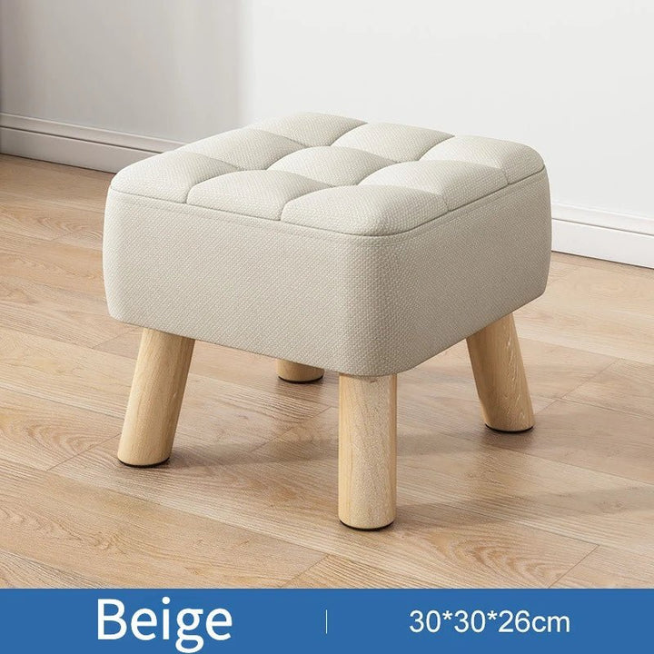 Padded ottoman stool in retro style in pastel colours