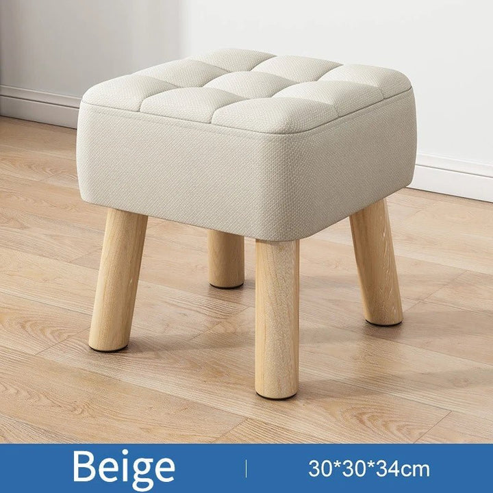 Padded ottoman stool in retro style in pastel colours