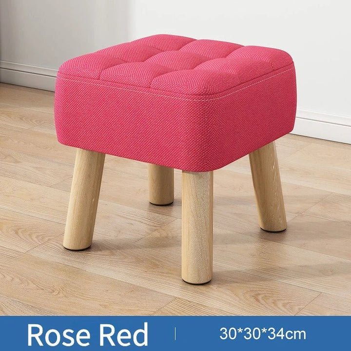 Padded ottoman stool in retro style in pastel colours