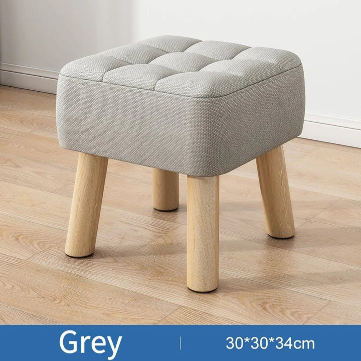 Padded ottoman stool in retro style in pastel colours