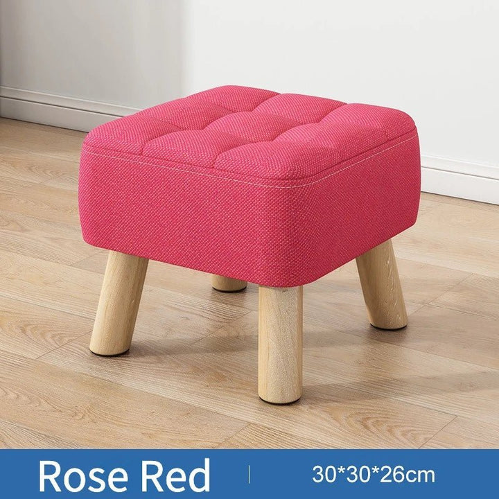Padded ottoman stool in retro style in pastel colours