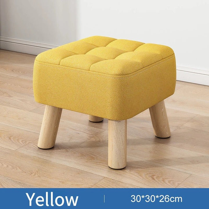 Padded ottoman stool in retro style in pastel colours