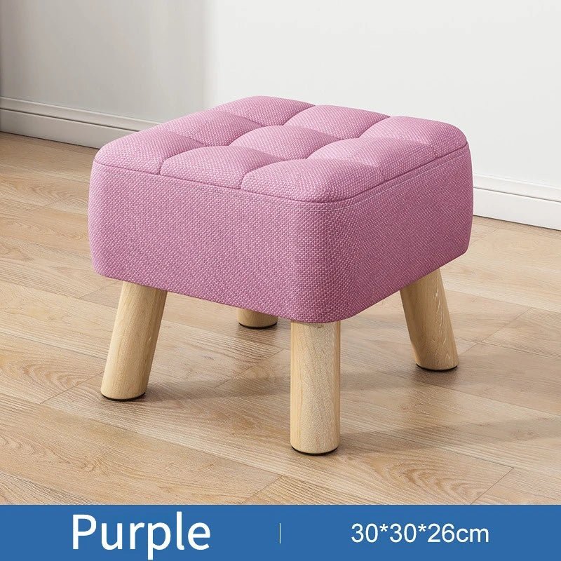 Padded ottoman stool in retro style in pastel colours