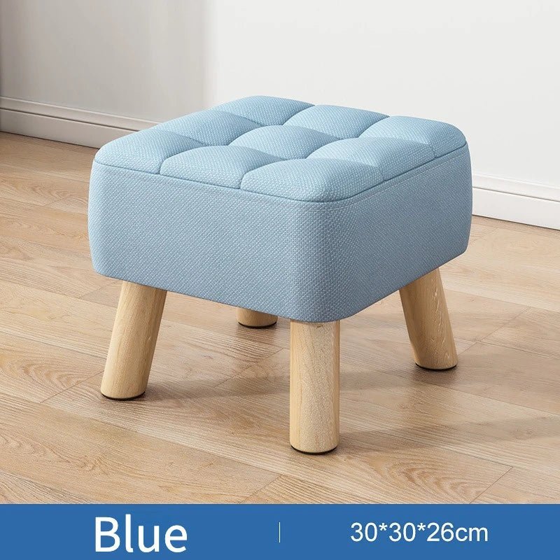 Padded ottoman stool in retro style in pastel colours